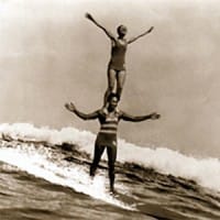 Doris Duke and Sam Kahanamoku Surfing in Hawaii