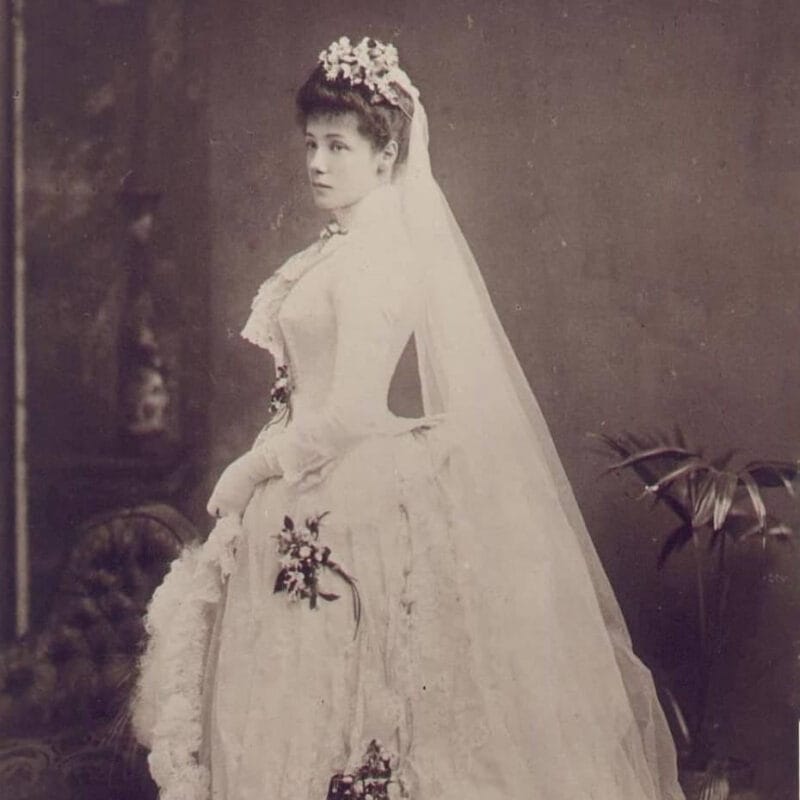 Black and white vintage photo of woman in wedding dress