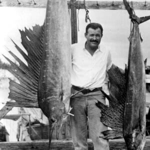 Photo of Ernest Hemingway with two sailfish