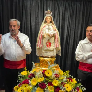 Two La Cofradía de La Conquistadora with La Conquistadora