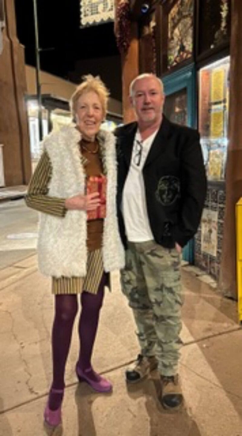 Photo of Sallie and friend on streetcorner