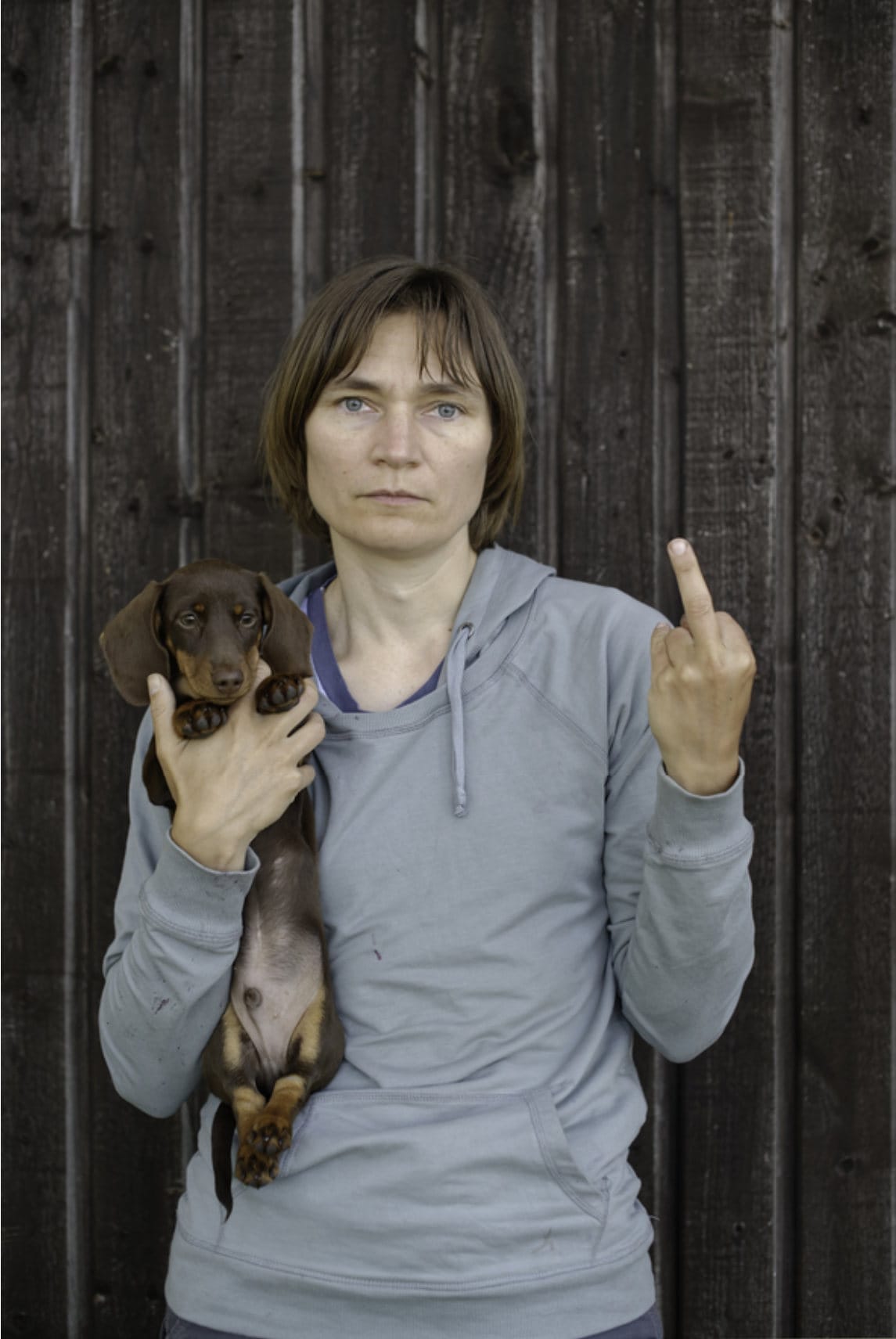 Photo of Elina Brotherus' self-portrait, "My Dog is Cuter Than Your Ugly Baby