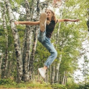 Photo of girl in air kicking