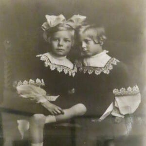 Antique photo of two little girls in dresses