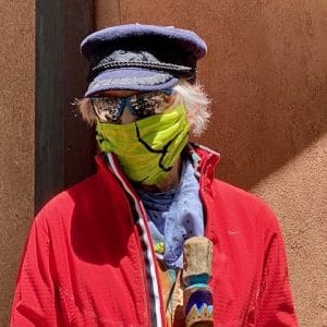 Photo of Sallie Bingham wearing a face mask