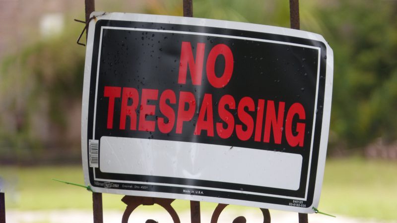Photo of No Trespassing sign on gate