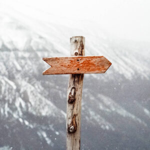 Photo of a trail marker in the winter mountains