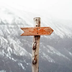 Photo of a trail marker in the winter mountains