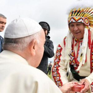The Pope greets an indigenous leader