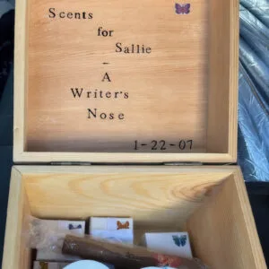 Photo of a wooden box containing small jars